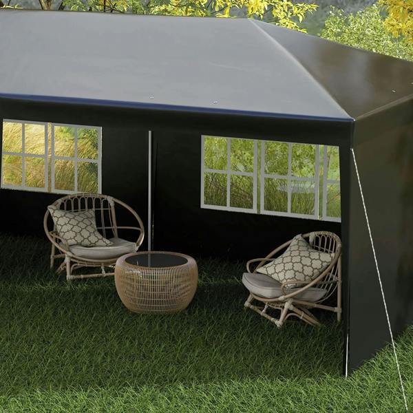 Black party tent gazebo interior close-up with transparent windows and lounge seating