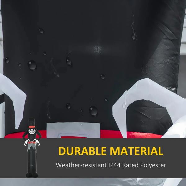 Black inflatable ghost with white apron panel and red trim, crinkled fabric texture