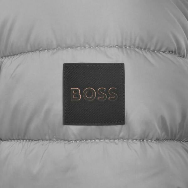 Grey BOSS Oden 2 puffer jacket featuring a quilted design and a black rectangular logo patch with metallic lettering.