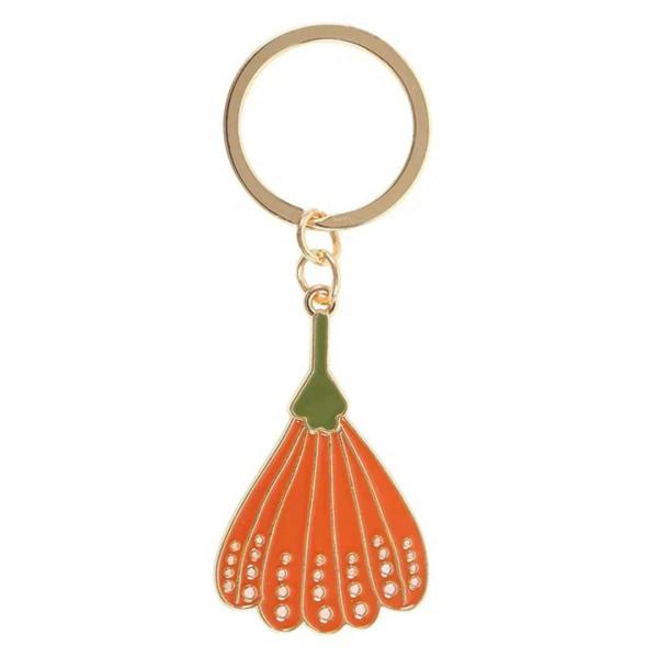 Gold enamel keyring with orange flower-shaped charm, green stem, and hanging ring