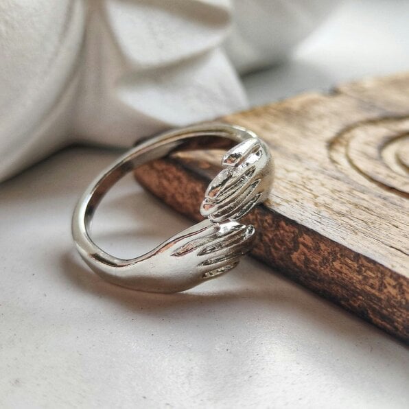 The Colourful Aura Silver Gold Hand Love Hugging Couple Adjustable Stackable Love Ring