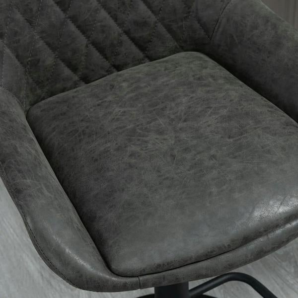 Dark grey upholstered bar stool seat cushion with quilted diamond tufting