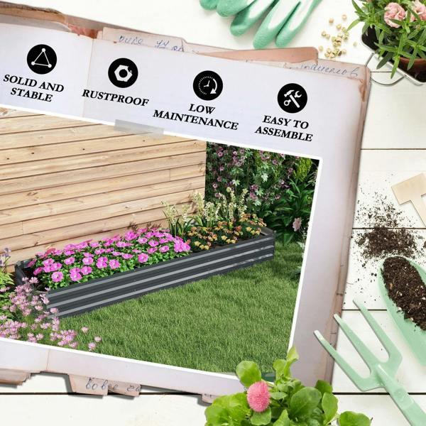 Dark grey galvanized steel planter box with open bottom and flowering plants along the rim