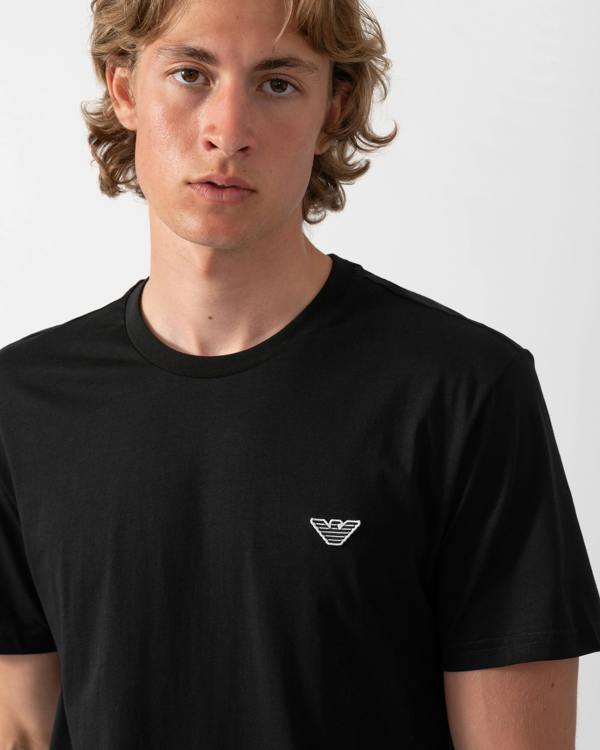 logo detail of an Emporio Armani Mens Beach T-Shirt with Eagle Logo in Black