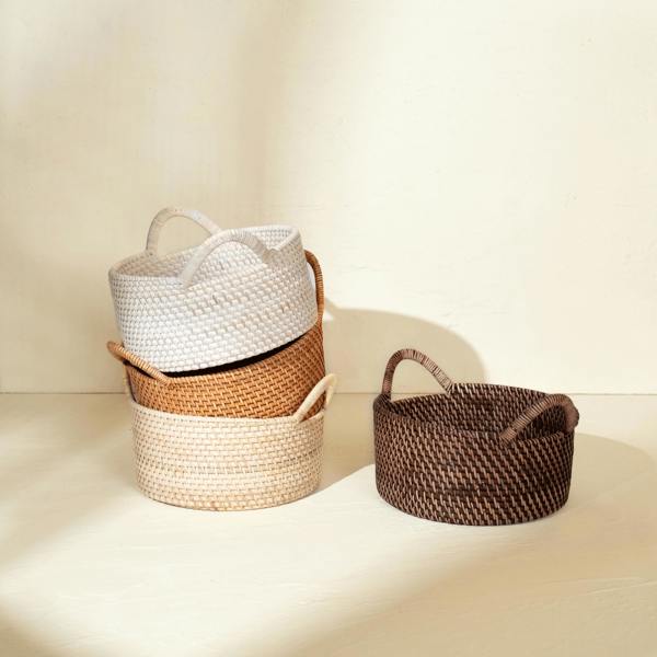 Dark brown small rattan round basket with handles handwoven wicker