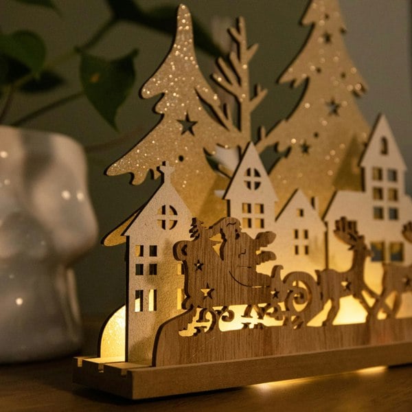 Samuel Alexander 20cm Battery Operated Light up Wooden Village with Santa in Sleigh and Warm White LEDs