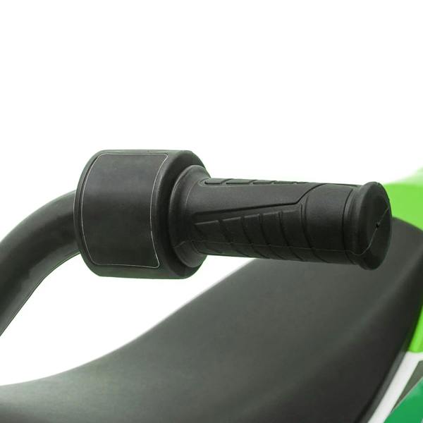 Black handlebar grips on green and white kids electric ride-on motorcycle