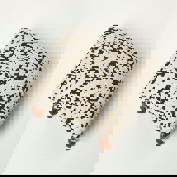 HOMESCAPES Reva Black Geometric Footstool