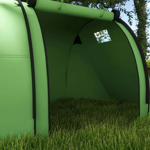 Green tunnel tent front entrance with arched frame and dark mesh panel