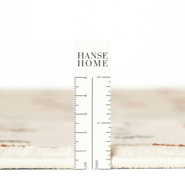 Textured fabric swatch with a ruler and 'HANSE HOME' branding.