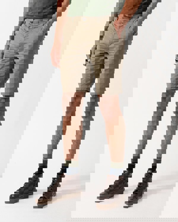 model wearing BOSS Orange Mens Slim Fit Chino Shorts in Stretch Cotton Twill, Open Green