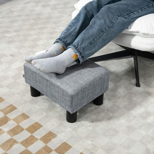 Grey linen ottoman footstool cube with black legs, upholstered sides