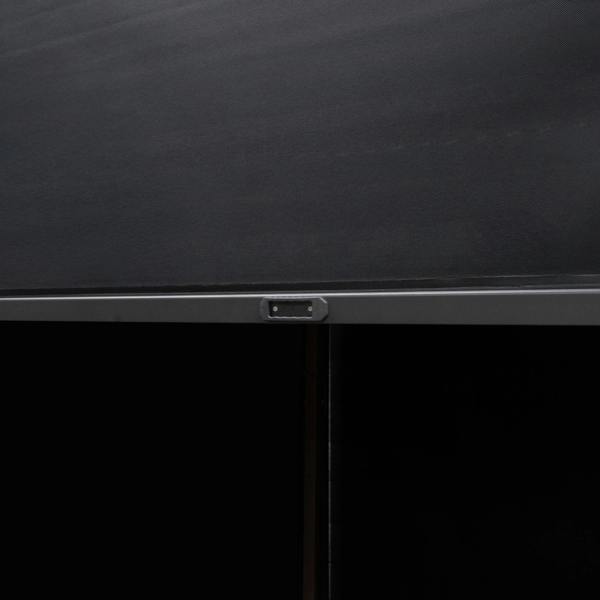 Close-up of the sleek black frame and textured fabric of the wood effect aluminium pergola with integrated blinds and LED lights
