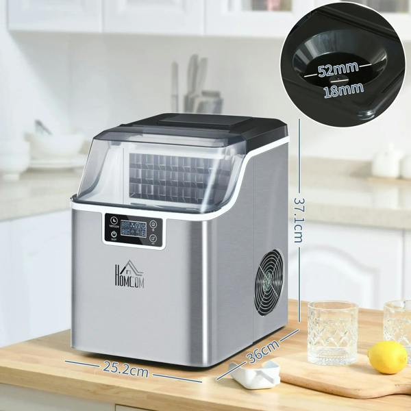 Silver-tone compact ice machine on countertop with front LCD panel and vent