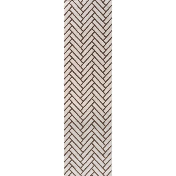 Rectangular area rug with a geometric pattern on a white background