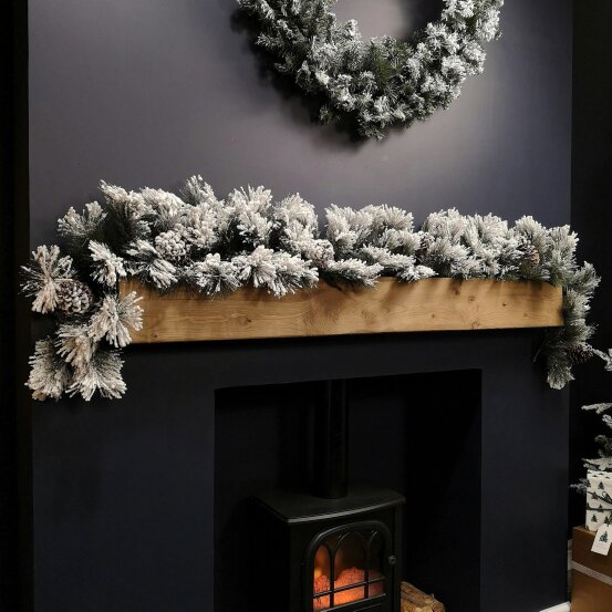 Samuel Alexander 6ft (1.8m) Premier Christmas Snow Flocked Green Garland with Pine Cones