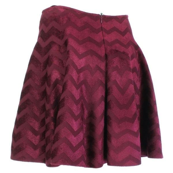 Alaia circular skater skirt in claret velvet with chevron patterning