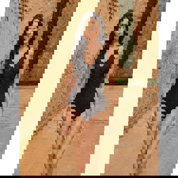 Black Miraclesuit Oceanus swimsuit in Miratex fabric with deep V-neck and ruching