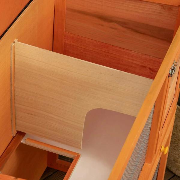 Wooden rabbit hutch top opening with hinged door panel inside the enclosure