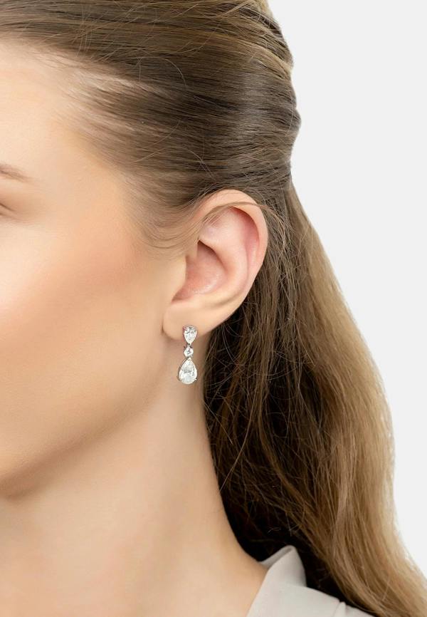 The earring worn by a model.