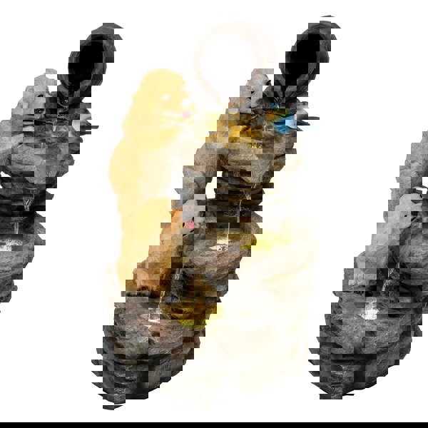 Canine Creek electric water feature with two playful golden retrievers and a bluebird, cascading water over textured stone tiers