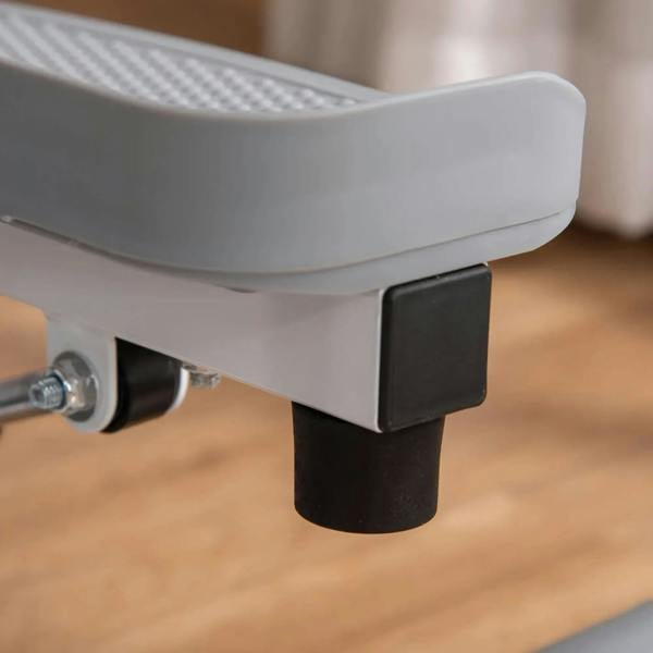 Twist stepper pedal support with black anti-slip foot and white housing