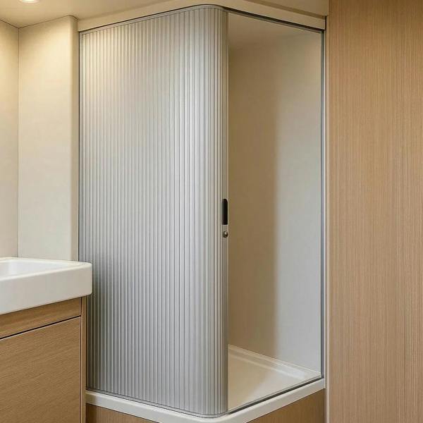 Silver Tambour shower door with vertical ribbed texture, sleek design, and modern finish, set in a stylish bathroom setting