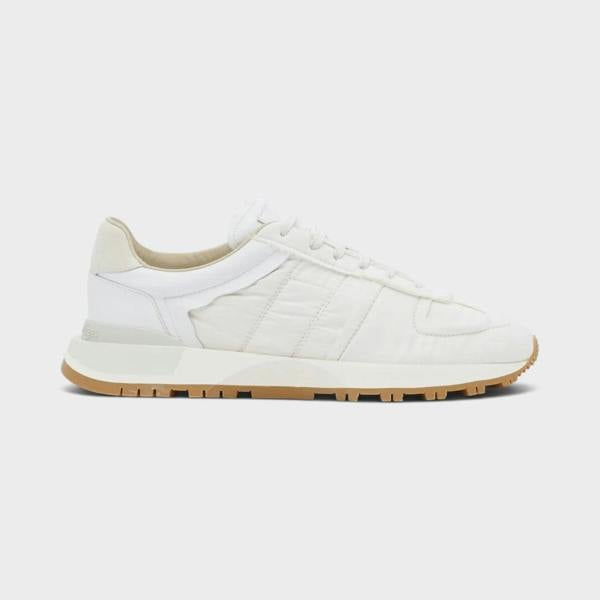 Supplied Fashion Maison Margiela 50-50 white sneakers featuring a mixed leather and textile upper with a gum sole.