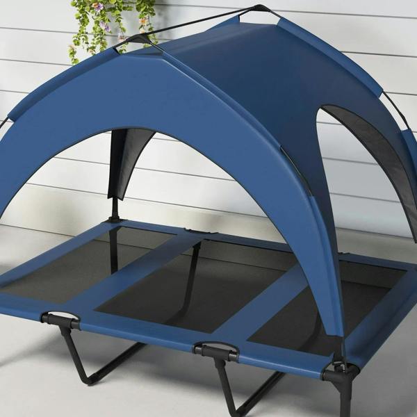 Dark blue arched canopy raised pet bed with black frame and mesh base