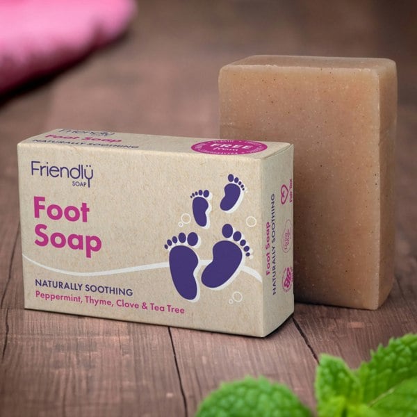 Foot Soap bar with packaging on a spa table with pink table