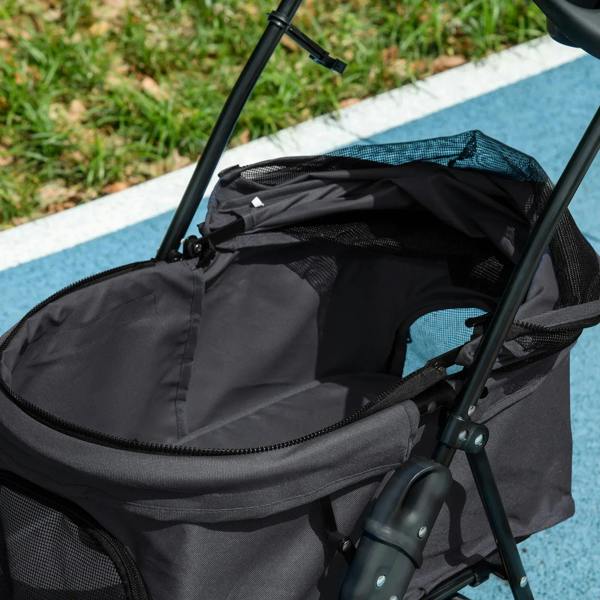 Black dog stroller seat with mesh panel, safety straps and side storage pocket