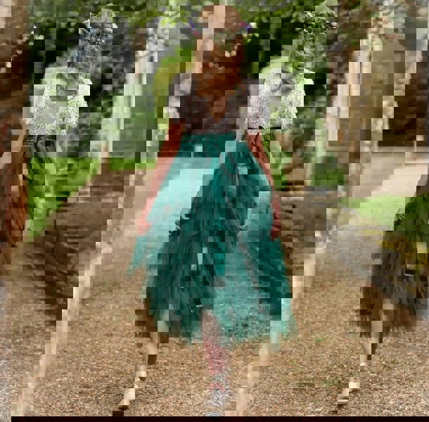 young girl wearing pretty dress