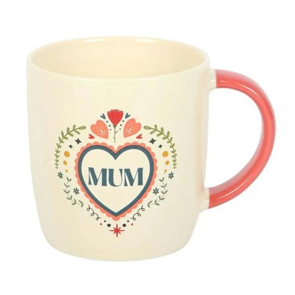 Cream mug with coral-pink handle and “MUM” heart folk wreath graphic