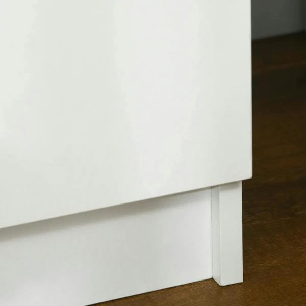 White bedside table corner with straight base leg and smooth high-gloss panels