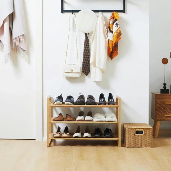 3-tier bamboo shoe rack with slatted shelves displaying shoes, natural wood finish