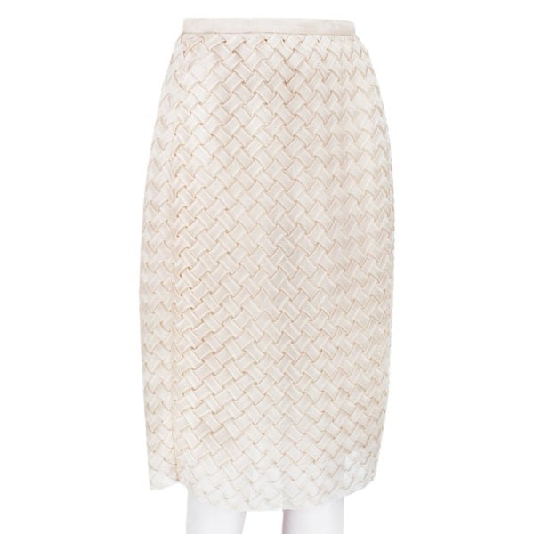 A Christopher Kane pencil skirt which is intricately shaped to appear woven