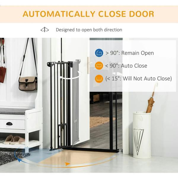 Black pet gate standing in doorway, with spring auto-close door design