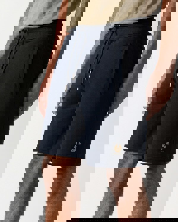 Close up shot of a Model wearing a Belstaff Mens Sweatshorts in Dark Ink