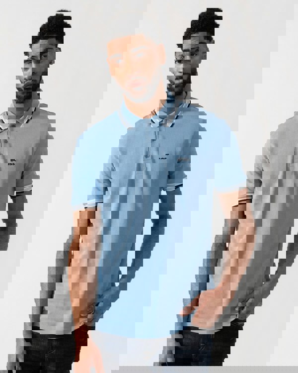 Model wearing BOSS Green Mens Paddy Cotton-Piqué Polo Shirt with Contrast Logo in Open Blue 469 - main