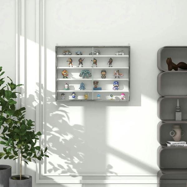 Grey wall display cabinet with glass doors and rows of figurines on shelves