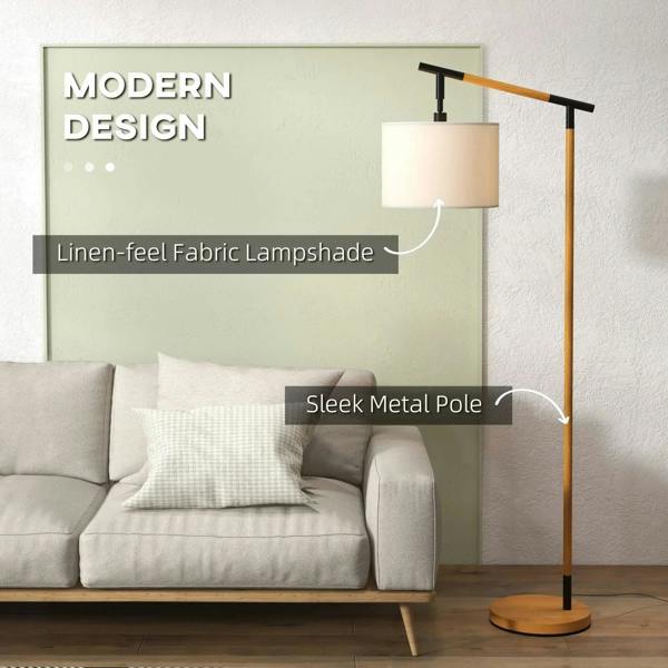 Brown floor lamp with linen-look drum lampshade and sleek metal pole