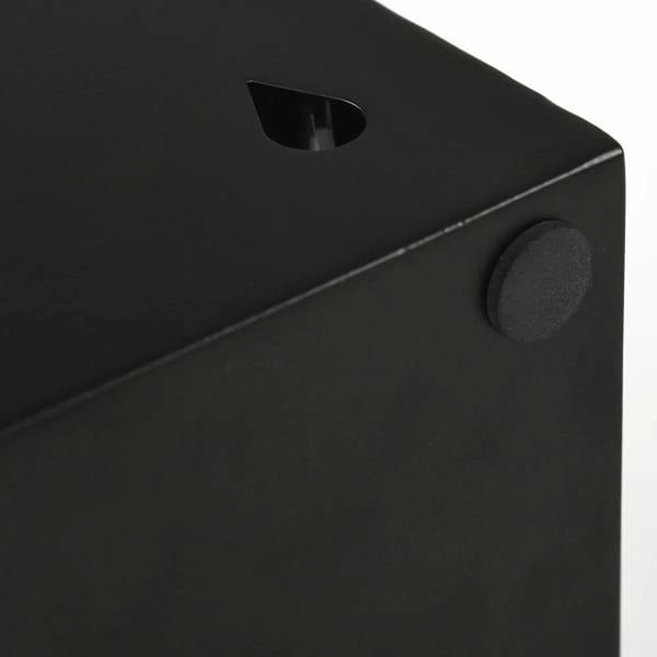 Close-up of black steel umbrella stand top edge and drip-tray access button