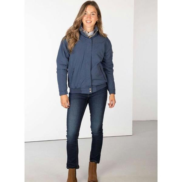 Full-length view of woman wearing the Rydale Ripon IV jacket in Dark Denim