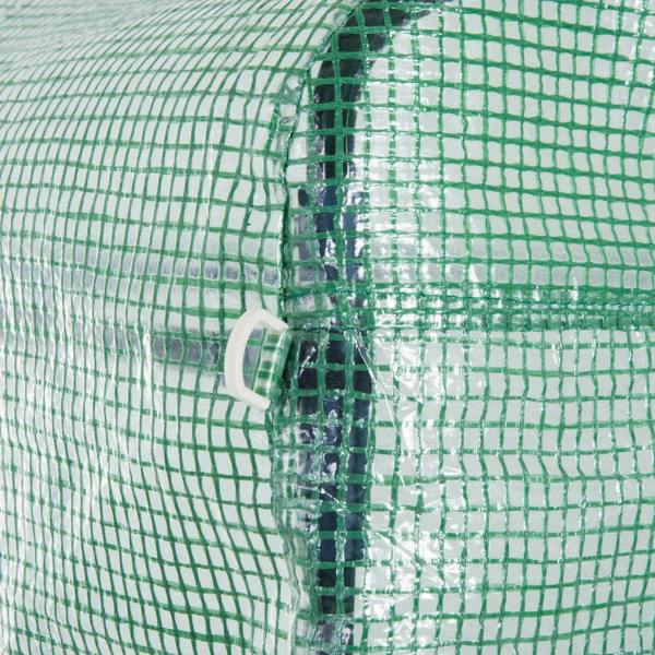 Close-up of green greenhouse mesh cover seam with reinforced edge stitching