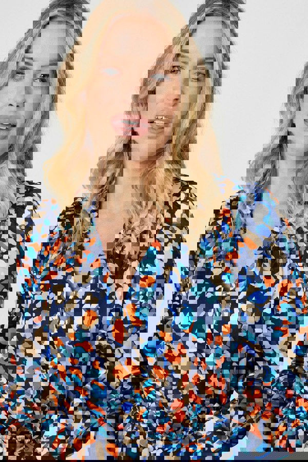 Navy | Printed Long Sleeve Peplum Blouse