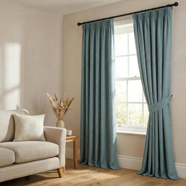 Mestre made-to-measure curtains in Soft Teal, styled in a living room