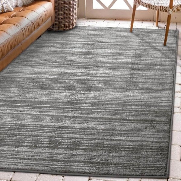 Arlo Textured Rug in soft grey tones with stripes, ideal for adding sophistication to modern interiors.