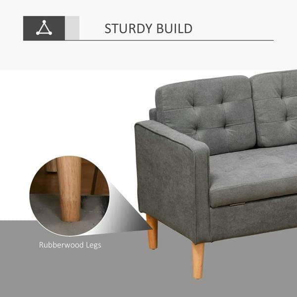 Grey button-tufted sofa with visible rubberwood legs