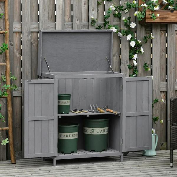 Dark gray wooden storage shed with open hinged roof and side access doors