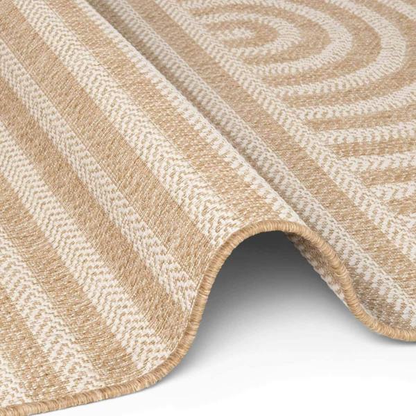 Close-up of a beige and white patterned rug on a white background
